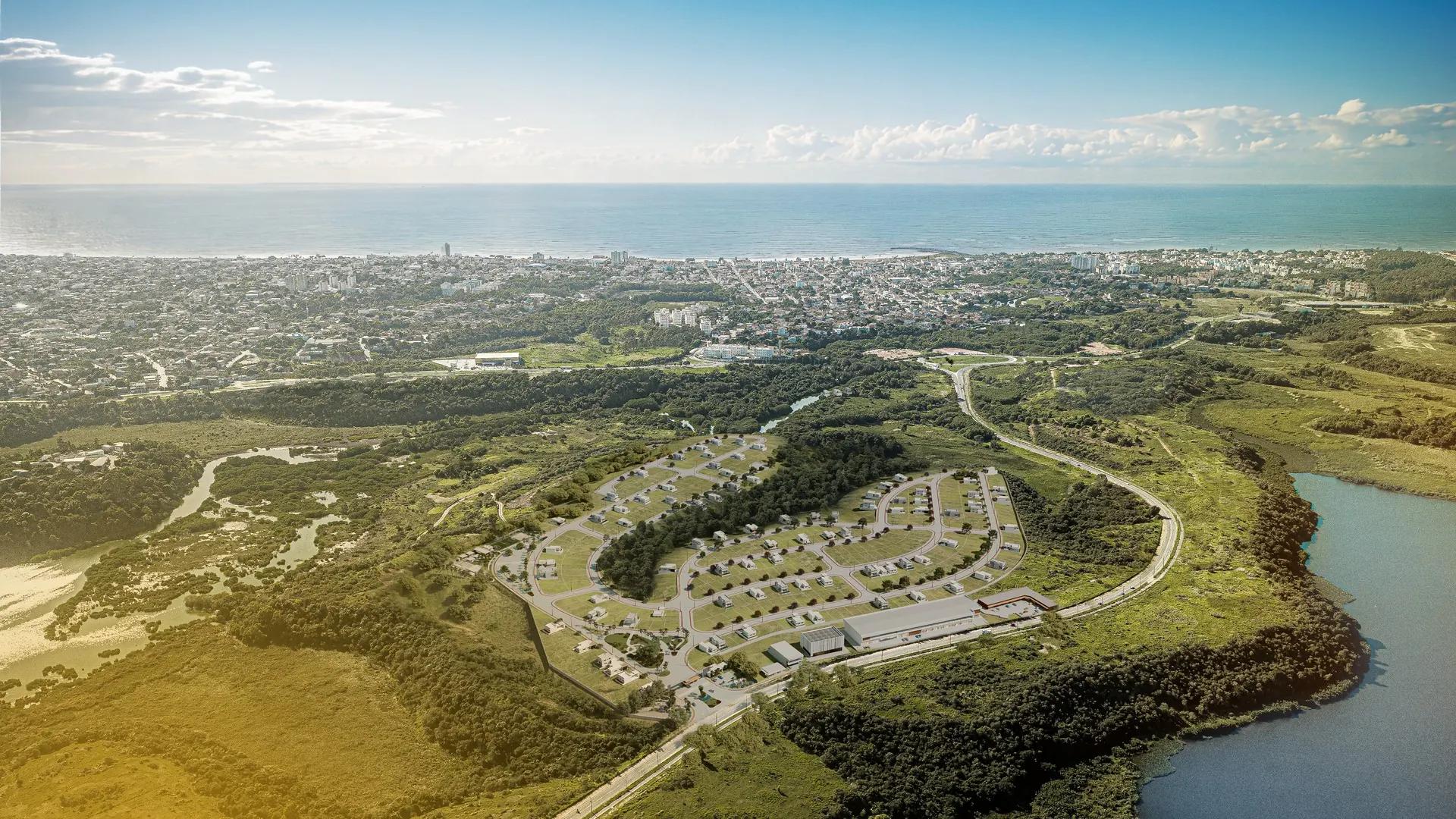 Vista aérea ilustrativa do Viva Juara com o empreendimento e a Lagoa Juara à direita